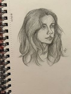 a pencil drawing of a woman's face