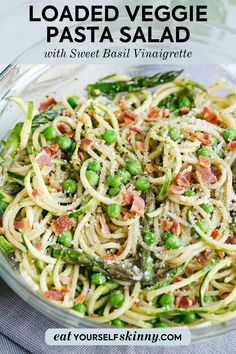 pasta with peas and bacon in a glass bowl