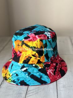 Handcrafted with 100% Ankara print. Reversible. Reversible Multicolor Brimmed Hat, Reversible Multicolor Cotton Bucket Hat, Multicolor Reversible Cotton Bucket Hat, Casual Multicolor Reversible Hat, Multicolor Reversible Cap, Adjustable Multicolor Reversible Hat, Reversible Multicolor Cotton Sun Hat, Reversible Multicolor Beach Hat, Reversible Multicolor Bucket Hat