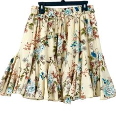 Sinplee Women’s Expandable Waist Floral Mini Skirt Cream Size L Elevate Your Style With This Stunning Simplee Women's Expandable Waist Floral Mini Skirt In Cream, Size L. The Skirt Features A Beautiful Floral Pattern And Pull-On Closure For Ease Of Wear. It Is Made Of A High-Quality Blend Of Polyester And Cotton, Ensuring Both Comfort And Durability. This Skirt Is Perfect For Any Occasion, Dress It Up With Heels Or Dress It Down With Sandals. It Is A Regular Fit And Has A Short Length That Is Pe Spring Bohemian Short Mini Skirt, Beige Floral Print Skirt For Vacation, Floral Mini Skirt, Skirt Length, Mini Skirt, Floral Pattern, Womens Skirt, Mini Skirts, Sandals