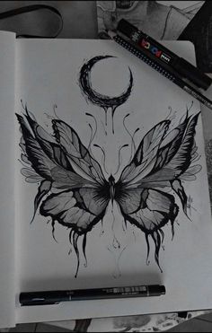 a black and white drawing of a butterfly with the moon in the background on paper