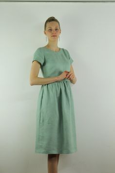 "Spring dress, Write the selected color in the message Handmade minty green linen dress with short sleeves , perfect for casual wear and suitable for any occasion in any season Details: - 100% natural linen produced in Europe ; - medium weight (180 gram per square meter); - color: minty green, Made to order, approximately a few days, If you have any questions please message me and I will be glad to answer. Size guide : Size S Bust: fits bust around 33\"-34\"/ 84-88 cm Waist: fits waist around 25 Casual Light Green Short Sleeve Dresses, Green Linen Dress For Daywear, Green Linen Dress With Relaxed Fit For Summer, Spring Green Linen Daywear Dress, Green Linen Spring Dress For Daywear, Spring Green Linen Dress For Daywear, Sage Midi-length Summer Dress, Sage Midi Length Summer Dress, Sage Midi Dress For Summer