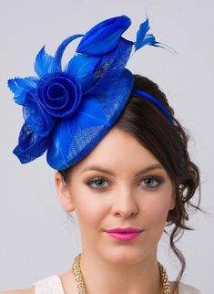 "\"Emelia Rose\" Royal Blue Fascinator This vintage-inspired fascinator is as timeless as a fairytale. Let your personality add life to its floral center and ribbon loop accents. It's round base and slip-on headband will allow you to look flawless and enjoy any event with ease! - Easy wear headband - Round sinamay base Add Men's Matching Bow Tie: Don't you dare get caught mismatching your sweetie's favorite fascinator! Pippa & Pearl now carries bow ties so you and your partner will look like Blue Mini Hats With Handmade Flowers For Royal Ascot, Blue Fascinator With Handmade Flowers For Kentucky Derby, Blue Handmade Flowers Fascinator For Races, Evening Costume Hats With Handmade Flowers, Blue Mini Hats With Handmade Flowers And Adjustable Fit, Adjustable Blue Mini Hats With Handmade Flowers, Formal Blue Fascinator With Handmade Flowers, Blue Spring Headpieces For Events, Adjustable Headpieces For Kentucky Derby And Vintage Events