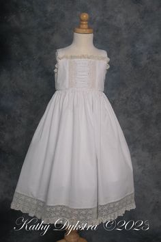 a white dress on a mannequin dummy