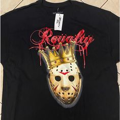 Jason , Friday The 13th Printed T-Shirt Black T-shirt For Halloween And Fan Conventions, Black T-shirt With Sublimation Print For Fan Events, Black Graphic Tee For Fan Events, Black Tops With Sublimation Print For Fan Events, Black Pop Culture T-shirt For Fan Events, Black T-shirt With Graphic Print For Fan Events, Black Pre-shrunk Shirt For Fan Conventions, Black Halloween T-shirt With Logo Print, Black T-shirt For Halloween Fan Conventions