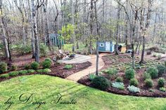 a backyard with lots of trees and landscaping