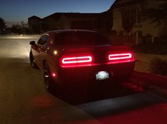 the rear end of a car at night