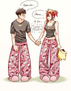 two people are holding hands and wearing pajamas