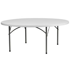 a white round table with black legs on a white background, viewed from the front