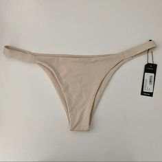 Tavik Swimwear Heather Bottom In Tapioca Cream Colored Super High Quality Swimwear Brand New In Perfect Condition, Never Worn, Still Has Sanitary Liner Size Large Brand Also Sold By Free People, Nordstrom, Madewell, Revolve, Asos, And Anthropologie Beige Lined Swimwear For Beach Season, Beige Lined Swimwear, Chic Beige Lined Swimwear, Beige Lined Swimwear For Summer, Chic Beige Stretch Swimwear, Fitted Beige Lined Swimwear, Fitted Beige Bottoms For Beach Season, Beige Fitted Bottoms For Beach Season, Beachwear Stretch Swimwear In Beige