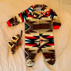 Authentic Native American Fleece One Piece Suit. Brand New, No Tags, Because I Washed It (Line Dried) But It Was Too Small For My Son. Size 6-9 Months. Pet Free And Smoke Free Home. Moccasins Not Included. Fall Onesie For Playwear, Fall Playwear Onesie, Brown Winter Onesie For Playtime, Cozy Fall Onesie For Playtime, Fitted Winter Onesie For Playwear, Winter Fitted Onesie For Playwear, Brown Onesie For Playtime In Fall, Brown Fall Onesie For Playtime, Winter Long Sleeve Multicolor Onesie