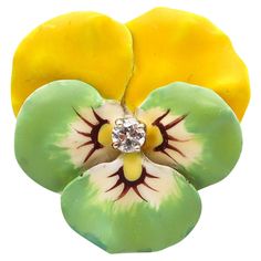 Edwardian enameled white Pansy flower brooch. Beautiful three-dimensional five-petals pansy flower, created in New Jersey North America during the Edwardian and the Art Nouveau periods, between the 1900-1910. This brooch has been carefully crafted in solid yellow gold of 14 karats with high polished finish and fitted at the reverse with a hinged pin bar and a mechanical lock to wear as a brooch. The flower's petals are embellished with applications of semi-glossy powder enamel of green, yellow a Green Flower Shaped Brooch Pins, Vintage Yellow Brooch Jewelry, Green Flower-shaped Brooch Pins, Vintage Enamel Flower Brooch, Vintage Yellow Flower Brooch, Flowers Petals, Edwardian Jewelry, Pansies Flowers, Edwardian Era