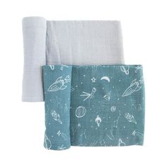 two pieces of blue and white cloth with space printed on them, one folded up