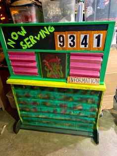 a toy vending machine sitting on top of a table