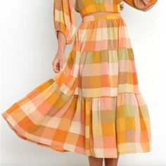 Detail: Nazzano Plaid Skirt -Checkered Print -Orange, Green, Beige Fall Colors -Tiered, Gathered Fabric -Zip Closure -Midi Length -Retails $59 Material: 100% Polyester Brand: Petal & Pup Condition: Brand New With Tags, No Flaws Or Stains From A Smoke-Free, Cat Friendly Home! Midi Tiered Skirt, Fall Brunch Tiered Skirt, Chic Flowy Multicolor Skirt, Flowy Maxi Skirt For Fall Brunch, Multicolor Beach Skirt For Fall, Multicolor Skirt For Vacation In Fall, Fall Long Skirt For Brunch, Long Skirt For Fall Brunch, Orange Flared Skirt For Spring