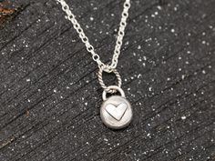 "Welcome to Silver Cave Designs. -------------------------{DIMENSIONS}---------------------------- *size of the pendant is 11mm x 8mm; *height of the pendant (inc. the bail ring) is 15mm; *thickness of the sterling silver cable chain is 1.5mm; *I offer 3 lengths of the chain, please choose either length: The listing is for a organic looking handmade sterling silver heart pendant necklace, with a sterling silver cable chain in 16inches, 18inches or 20inches. This sterling silver heart pendant is Handmade Heart Charm Necklace For Everyday, Handmade Everyday Heart Pendant Necklace, Everyday Handmade Heart Pendant Necklace, Nickel Free Everyday Heart Necklace, Handmade Heart Pendant Necklace For Everyday, Handmade Silver Heart Charm Necklace, Handmade Heart-shaped Sterling Silver Charm Necklace, Handmade Sterling Silver Heart Charm Necklace, Adjustable Heart Charm Necklaces For Everyday