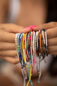 These bracelets are so cute and colorful, sure to give a pop of color to any look. They give a boho vibe and look great dressed up or down. Stack or wear alone. We have so many cute styles, and they makes the perfect gift! Details:       12 styles     Each stack comes with 3 rows of beads     Size is adjustable (7" - 9")     Materials:     Nylon with beads Dainty Summer Party Bracelets, Trendy Beaded Bracelets For Summer Festivals, Trendy Summer Festival Beaded Bracelets, Hippie Braided Bracelets With Round Beads For Festivals, Turquoise Beaded Friendship Bracelets For Summer, Trendy Colorful Beads Wrap Bracelet, Trendy Colorful Beaded Wrap Bracelet, Bohemian Summer Beaded Bracelets Hand-strung, Hand-strung Bohemian Beaded Bracelets For Summer