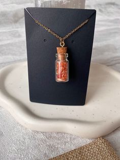 ✨Handmade high grade Sunstone crystal bottle pendant (approximately 3cms), crafted from high quality natural Sunstone and stainless steel, perfect sensitive skins. Tarnish resistant jewellery that will last a lifetime ✨ (Bottle cork is secure and not removable) 🧡Sunstone: Keeping a piece of sunstone on you or wearing it, brings feelings of happiness, & inspires co-creation. Sunstone carries the energy of the Egyptian Sun God Ra, bringing positive energy to your sacred space, it activates the Sa Crystal Chip Necklace, Egyptian Sun, Sunstone Crystal, Crystal Bottle, Chip Necklace, Summer Jewellery, Bottle Pendant, Sun God, Precious Gemstones Jewelry