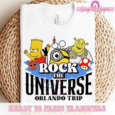 a white t - shirt with the words rock the universe and cartoon characters on it