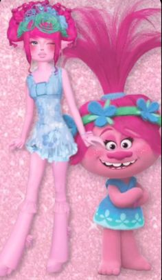 a pink troll doll next to a girl in a blue dress on a pink background