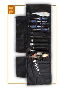 an open travel bag with various items in it and the contents inside are neatly packed