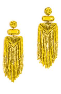 Beaded fringe brings shake and shimmer to these handmade drop earrings. 4" drop; 1 1/4" width Steel post back Glass/enamel/goldtone plate/faux leather Imported Fringe Dangle Chandelier Earrings, Yellow Fringe Dangle Jewelry, Yellow Fringe Jewelry For Party, Elegant Yellow Fringe Earrings, Chartreuse Color, Deepa Gurnani, Summer Wardrobe Essentials, Wedding Guest Shoes, Steel Post