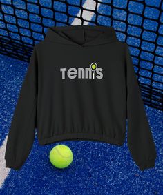 Retro Tennis Sweatshirt, Sports Mom Shirt, Tennis Club Sweater, Tennis Shirt, Women's Sweatshirt, Cinched Bottom Hoodie, and Tennis Gift for Her. Style stacked upon style: this hoodie is an absolute must for any cold day. Made with a boxy, oversized fit, it hits all the cozy marks one needs to feel at home wherever they are. The mid-length design along with the cinched elastic hem, add extra fashion points for any casual outing while the 52% Airlume cotton and 48% ring-spun cotton/polyester fleece blend feels impeccable to the touch.  PRODUCT INFORMATION .: 52% Airlume combed and ringspun cotton, 48% polyester (Athletic Heather is 90/10 Airlume combed and ring-spun cotton/polyester fleece) .: Medium-heavy fabric (8 oz/yd² (271 g/m .: Oversized fit .: Tear-away label CARE INSTRUCTIONS: Turn Sporty Workout Sweatshirt With Drawstring Hood, Sporty Sweatshirt With Drawstring Hood For Workout, Sporty Hooded Top With Relaxed Fit, Sporty Hooded Sweatshirt, Sportswear Sweatshirt With Drawstring Hood For Sports Events, Athleisure Hoodie With Letter Print, Letter Print Hoodie Top Athleisure, Sporty Fleece Top For The Gym, Letter Print Athleisure Hoodie Top