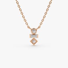 Made to Order
Gold KT: 14K Solid Gold
Round Diamond: 2 pcs 1.75 MM
Baguette Diamond: 1 pc 3x1.5 MM
Total CTW: 0.13ctw
Diamond Color-Clarity: G Color VS Clarity
Setting Type: Bezel and Chanel

A dazzling baguette cut diamond is cradled above and below with a single stunning round cut diamond. Baguette Diamond Necklace, Baguette Cut Diamond, Baguette Cut, Diamond Pendant Necklace, Diamond Color, Baguette Diamond, Necklace Sizes, Round Cut Diamond, Diamond Gemstone