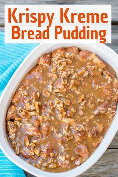 a white bowl filled with bread pudding on top of a blue towel and wooden table