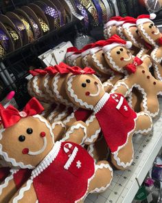 several gingerbread cookies are arranged on a shelf