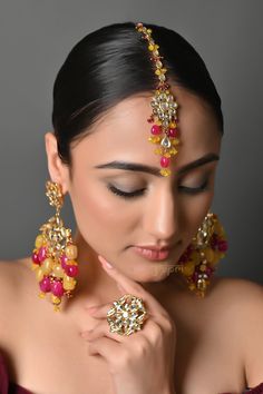 Kundan Maang Tikka And Earrings Set, Pearl Maang Tikka Set, Indian Jewelry, Indian Wedding Jewelry, Kundan Freesize Ring, Punjabi Jewellery Kundan mang tikka and earrings with semiprecious beads and freesize ring. This beautifully handcrafted jewelry is set in copper alloy and plated with 22k gold. Best additions to your wardrobe PRODUCT DETAIL: * Earrings Length: 3.25 inches approx * Maangtikka Length: Freesize * Material: brass, and stone * Package: Earrings and mang tikka, ring (optional) STYLE TIP: This jewelry is a perfect accessory for any type of occasion, wedding, and celebration. They look good with almost any traditional classic ABOUT US: Jaipri makes each piece of its product by learning techniques and crafts from deep down in the local markets and villages. We use Indian raw ma Meenakari Chandbali Bridal Earrings, Meenakari Earrings For Marriage And Festivals, Fusion Style Matching Earrings For Wedding, Fusion Style Wedding Jewelry With Matching Earrings, Kundan Chandbali Earrings For Marriage, Traditional Kundan Earrings For Marriage, Traditional Kundan Earrings For Wedding, Traditional Bridal Sets With Matching Earrings For Wedding, Fusion Style Kundan Jhumkas For Wedding