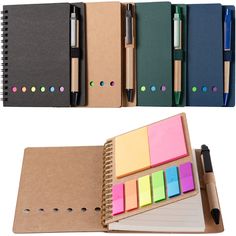 two notebooks with different colored sticky notes and pens on them, one is empty