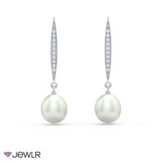 These classic freshwater pearl drop earrings are so versatile and can elevate any outfit. She will love how easy they are to wear to work during the daytime and transition for an elegant night out. These half drilled 8mm width pearls dangle and dance around with the slightest of movement. The sterling silver spear inspired bar is pavé set with glimmering cubic zirconias. You can wear these drop earrings alone or complete the look with the matching Pavé Bar Drop Pearl Pendant. Drop Pearl Earrings, Freshwater Pearl Drop Earrings, Bridal Ideas, Wedding Vision, Mens Engagement, Fabric Craft, Wear To Work, Wedding Board, Pearl Drop Earrings