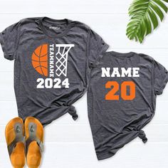 two personalized basketball shirts, one with the number 20 and the other with an orange basketball