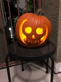 a carved pumpkin sitting on top of a table