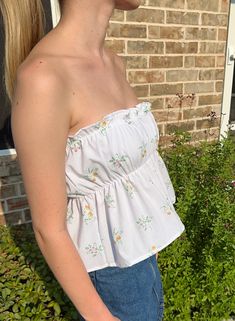 Get ready to turn heads in The Amelia Top! Made with love from 100% thrifted materials, this scrunch tube top features a playful mix of dainty pinstripes and floral bouquets. With an elasticized design, it's easily adjustable for a perfect fit. Size Guide: Size 4: Bust 33-36, Waist 27-30 Size 10: Bust 36-40, Waist 30-34 Casual Cotton Smocked Top For Spring, Fitted Floral Print Cotton Smocked Top, Feminine Cotton Smocked Top For Spring, Summer Cotton Smocked Top With Floral Print, Cotton Smocked Top With Floral Print For Day Out, Summer Top With Smocked Bodice For Garden Party, Trendy Tops For Spring Garden Party, Trendy Tops For Summer Garden Party, Summer Garden Party Top With Smocked Bodice