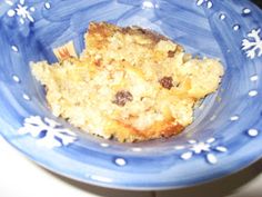 a piece of cake sitting on top of a blue plate with snowflakes around it