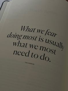 an open book with the words what we fear doing most is usually what we most need to do