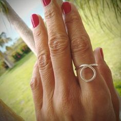 *Cool modern loop ring made in a thick sterling silver 925 wire. *Great for index or any finger! *Hammered and polished. *Ships within 3-5 business days in a nice and safe packaging. * I include a piece of polishing cloth to keep your ring nice and bright always. *To see more of my original handmade rings visit my etsy shop rossanajewelrydesign.etsy.com *Thank you! Simple Full Circle Sterling Silver Jewelry, Simple Sterling Silver Open Circle Jewelry, Sterling Silver Hammered Circle Jewelry, Hammered Silver Full Circle Jewelry, Silver Open Circle Hammered Jewelry, Small Circle, Circle Ring, Wire Rings, Handmade Rings