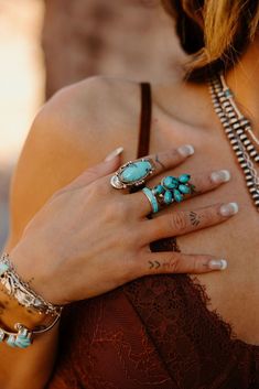 She’s got that cowgirl spirit, loaded up with handcrafted Turquoise jewelry. Kiersten and Yesenia Bailey Photography create magic for us here at Turquoise Tuesday taking our handcrafted Turquoise rings, necklaces and bracelets to Las Vegas for this cowgirl aesthetic shoot.‌ #cowgirl #lasvegas  #turquoise #turquoisejewelry #turquoiserings #turquoisenecklace #handcraftedjewelry #CowgirlStyle #MontanaMoments #TurquoiseLove #WesternGlam #ArtisanJewels #CowgirlChic #cowgirlaesthetic Turquoise Earrings Outfit, Handmade Turquoise Jewelry, Turquoise Stone Jewelry, Earrings Outfit, Turquoise Jewelry Native American