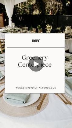 a table set up with place settings and white linens for a ceremony centerpiece