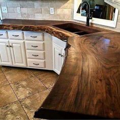 a kitchen counter top made out of wood