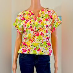 This Is A Gorgeous Top Perfect For Your Next Vacation! Rilled Short Sleeves, V-Neck, Small Chest Pockets. Can Be Worn Blousy Or Tucked In. Very Luxurious Feel. This Is Nwot From A Smoke Free Home. Originally $49.95. Size Small But Is Oversized With Ptp At 20” (No Stretch) And Length At 27”. Bundle & Save With Many Other Great Finds By Visiting My Closet @Youfoundcoco. Vibrant Yellow Tops For Spring, Multicolor Split Neck Top For Spring, Green Split Neck Top For Spring, Stretch Yellow Tops With Floral Print, Vibrant V-neck Top For Spring, Yellow V-neck Blouse For Spring, Vibrant Yellow Short Sleeve Tops, Stretch V-neck Multicolor Blouse, Yellow V-neck Blouse With Floral Print