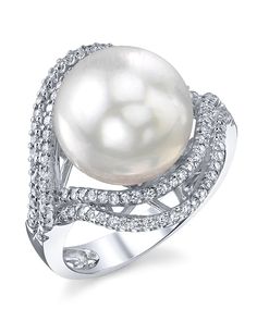 This gorgeous 18K white gold pearl ring is mounted with a beautiful 12mm AAA quality white south sea pearl with 'Very High' luster (please see our pearl grading section for more information). This beautiful pearl ring includes .52 carats of SI-quality diamonds and is made of 5.78 grams of the highest quality 18K gold. All pearl rings are approved by our staff of GIA pearl experts and come packaged in a beautiful pearl jewelry box. Please view the options below to customize your pearl ring to you White Gold Pearl Ring, Blue Sapphire Diamond Ring, Pearl Rings, Gold Pearl Ring, Golden South Sea Pearls, Pearl And Diamond Ring, Pearl Jewelry Sets, Blue Sapphire Diamond, Pearl Leather