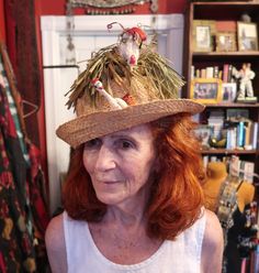 This is the most outrageous hat I have ever seen! Have had for years and yes actually wore at the beach a couple of times. And was I a traffic stopper on the boardwalk!  Mostly though this has been more of a conversation piece. This is made by Mr. Kenneth and for all you younger ladies out there, he was THE designer in the 60s. Jackie Kennedy was probably his most famous client. I have only seen a couple other of these outrageous hats as I never thought he was that wild and crazy of a designer but you never know. Check him out on the internet. I have a big head so hard to tell if supposed to stand so tall on head or just my head is too big. The crown opening measured on inside is @ 22.5". Don't go by pix of it on golden mannequin head as that is not real life size. Inside label reads "Mr. Fun Brimmed Summer Costume Hats, Fun Wide Brim Summer Hat, Novelty Curved Brim Hat For Beach, Novelty Curved Brim Hat For The Beach, Novelty Hat With Curved Brim For The Beach, Novelty Curved Brim Hat For Vacation, Novelty Beach Hat With Curved Brim, Fun Curved Brim Hat For Kentucky Derby, Novelty Wide Brim Hat For The Beach