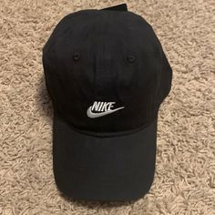 This Is A Black Nike Hat. It Is A Velcro Back. It Is A Youth Hat. It Is Also Nwt - Never Worn! Black Nike Casual Hat, Casual Black Nike Hat, Basic Black Cotton Hat, Nike Adjustable Dad Hat For Streetwear, Nike Cap For Streetwear, Nike Casual Snapback Hat, Casual Nike Baseball Cap, Nike Casual Dad Hat For Streetwear, Nike Black Baseball Cap For Streetwear