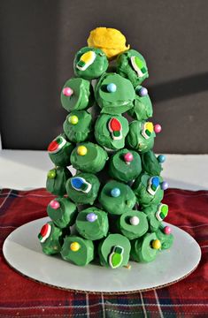 a christmas tree made out of cookies on a plate