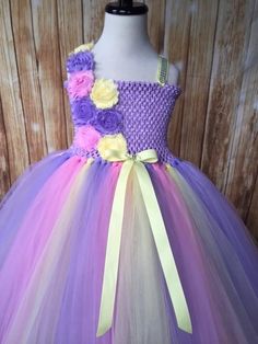 FREE SHIPPING on all orders within the US, no coupon code needed! Lavender Tutu dress by Little Ladybug Tutus. Handmade Tutus for girls specializing in birthday party dresses, Halloween costumes, flower girl dresses, pageant tutus, 1st birthday tutus, and blinged Converse sneakers. We accept custom orders! ORDER PRODUCTION TIME Please check the top of our website's home page for current turn around time. Since all items are handmade at the time of purchase, there is a production time that varies Lavender Fitted Princess Dress For Dress-up, Purple Princess Dress For Spring Dress-up, Purple Princess Dress For Dress-up In Spring, Purple Spring Birthday Dress, Purple Princess Dress For Spring, Spring Birthday Princess Dress In Purple, Spring Birthday Purple Princess Dress, Purple Princess Dress For Birthday In Spring, Lavender Princess Dress For Dress-up