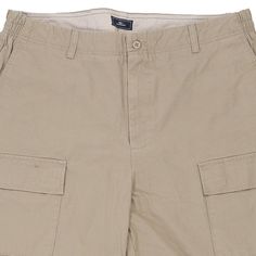 Vintage Dockers beige cargo shorts, fit a 37" waist and 9" inseam. WAIST: 37 inches / 94cmsINSEAM: 9 inches / 23cmsRISE: 13 inches / 33cmsGENDER: mens CONDITION: good - small mark on front left leg and back right leg.STYLE: cargo shortsERA: 1990sCOLOUR: beigeFABRIC: cotton Khaki Bermuda Cargo Shorts With Multiple Pockets, Utility Bermuda Cargo Shorts In Khaki, Utility Style Short Cargo Pants In Beige, Khaki Bermuda Cargo Shorts In Utility Style, Khaki Short Length Cargo Pants With Patch Pockets, Khaki Short Cargo Pants With Cargo Pockets, Short Length Khaki Cargo Pants With Cargo Pockets, Beige Utility Cargo Pants Short Length, Khaki Short Length Cargo Pants With Pockets