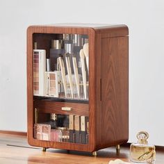 "W H Y ∙ Y O U ' L L ∙ L O V E ∙ I T *To give your Makeup Beauty Cosmetic & toiletry,jewelry a space for orderly placement, it is absolutely right to choose this  High-capacity Vintage Wooden Makeup Organizers Storage box! *The  Large Cosmetic Storage box with door and 2 drawer,High-end cosmetics storage box, elegant and generous,the reasonable zoning layout,so that your various cosmetics tools and supplies can be placed in order. *The lotion storage compartment is 18.5cm high,it is  easy to store and use.such a refrigerator makeup cabinet, beautiful and magnificent,make people like it at a glance. *The  Cosmetic Storage cabine,design 2 drawer,the top drawer without partition, can hold Facial mask, sunglasses, watches, etc,the bottom drawer set Large grid, small grid partition,can hold wat Makeup Cabinet, Wooden Makeup Organizer, Lotion Storage, Makeup Storage Organization, Custom Jewelry Box, Cosmetic Display, Bathroom Countertop, 5th Anniversary, Anniversary Gifts For Wife